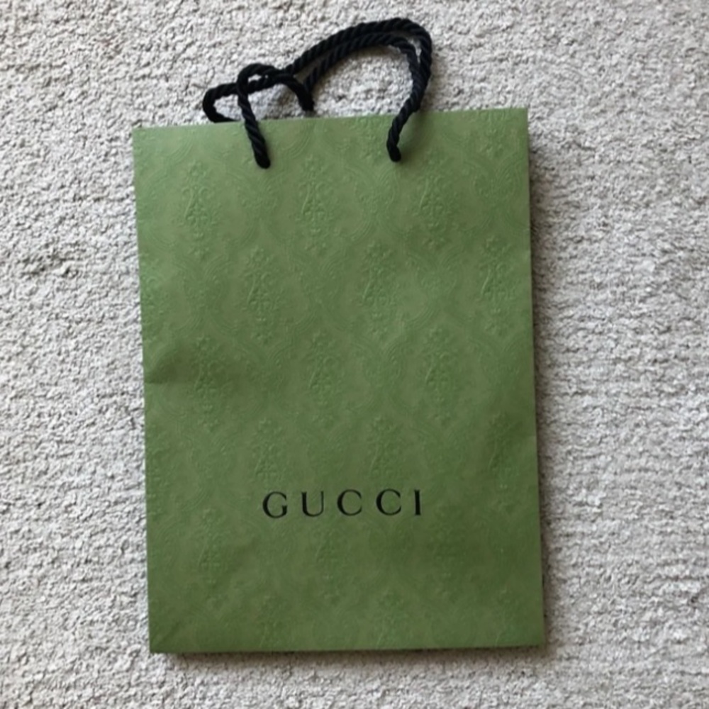 Authentic Gucci Paper Embossed Paper Bag with Gucci Logo.